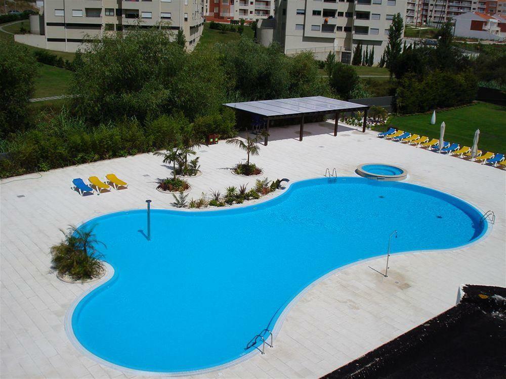 Malibu Foz Hotel - La Maison Younan Figueira da Foz Bagian luar foto Swimming pool in the complex
